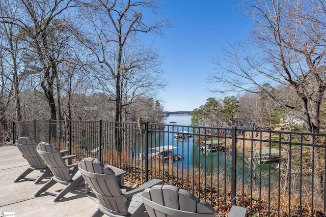 view of patio / terrace featuring a water view