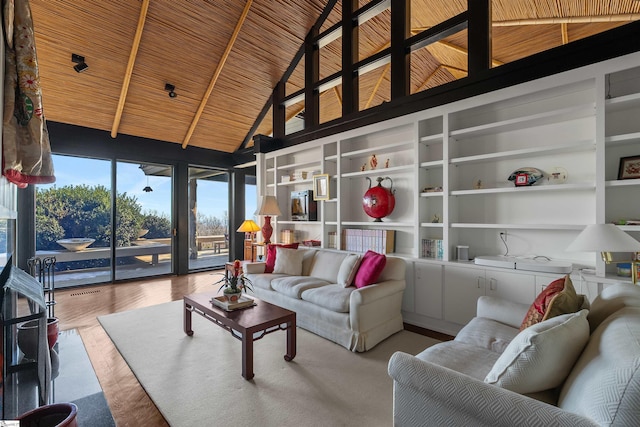 living room featuring wood ceiling, hardwood / wood-style flooring, beam ceiling, high vaulted ceiling, and built in shelves