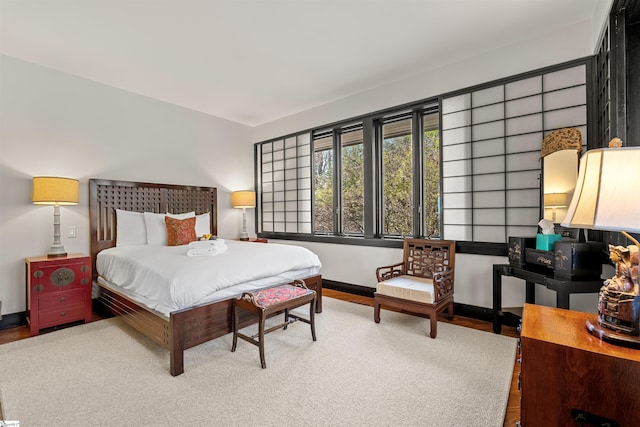 bedroom featuring wood-type flooring