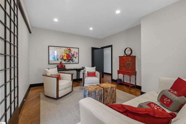 living room with light hardwood / wood-style floors