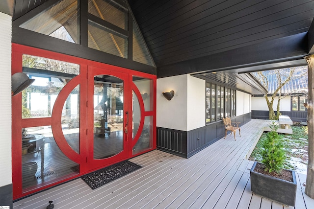 wooden terrace featuring french doors