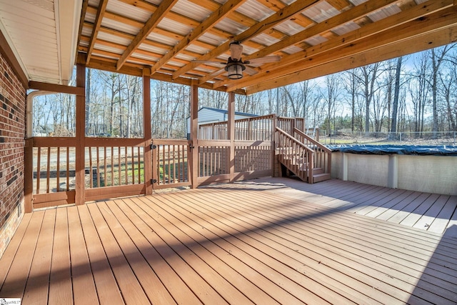 wooden deck with ceiling fan