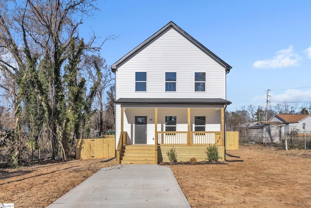 view of property with covered porch