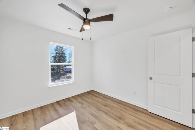 unfurnished room featuring ceiling fan and light hardwood / wood-style floors