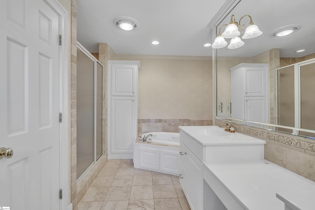 bathroom featuring vanity, an inviting chandelier, tile walls, and independent shower and bath