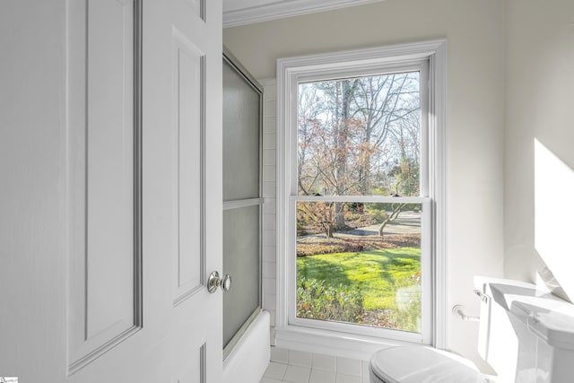 doorway to outside featuring plenty of natural light and light tile patterned floors