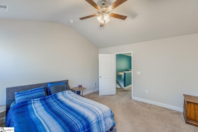 carpeted bedroom featuring vaulted ceiling and ceiling fan