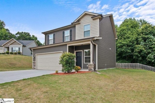 view of front of property with a garage and a front lawn