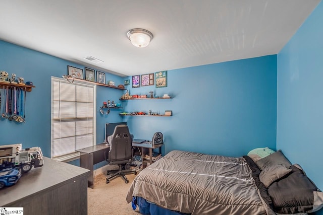 bedroom featuring light carpet