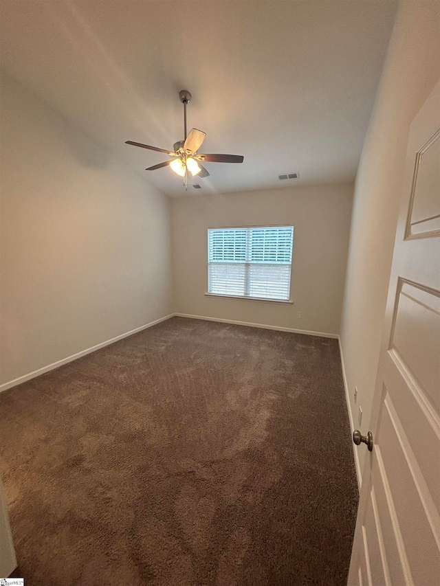 carpeted empty room with ceiling fan