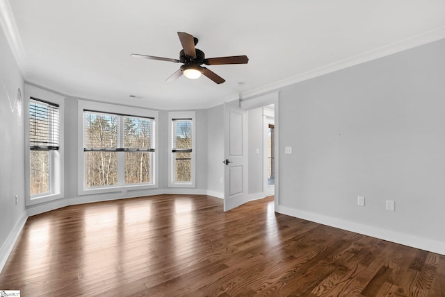 spare room featuring crown molding, ceiling fan, and hardwood / wood-style flooring