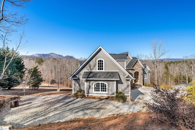 view of front of house featuring a mountain view