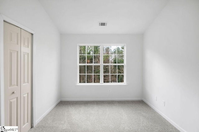 empty room featuring carpet floors