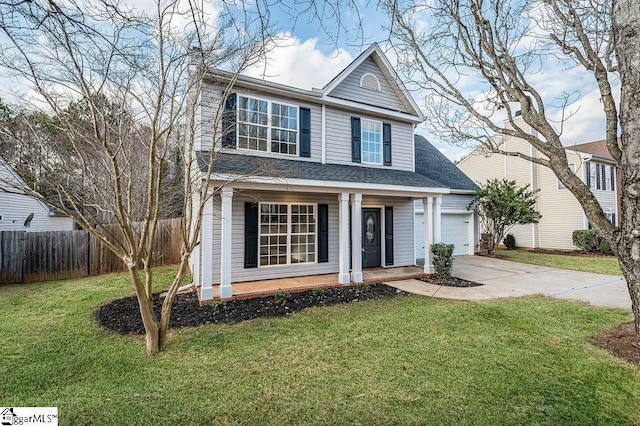 front facade featuring a garage and a front lawn