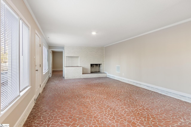 unfurnished living room featuring ornamental molding and a fireplace