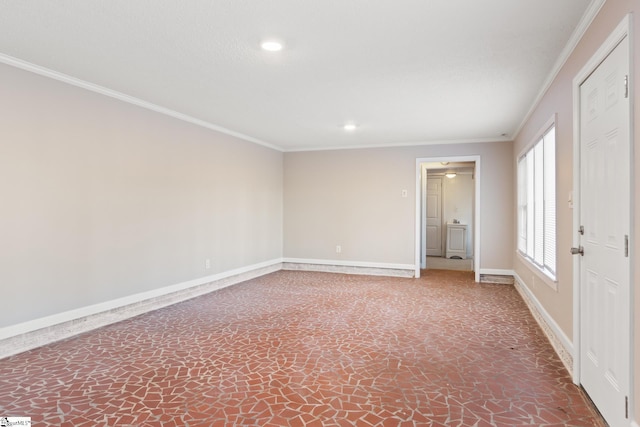 empty room featuring ornamental molding