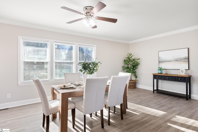 dining space with hardwood / wood-style floors and plenty of natural light