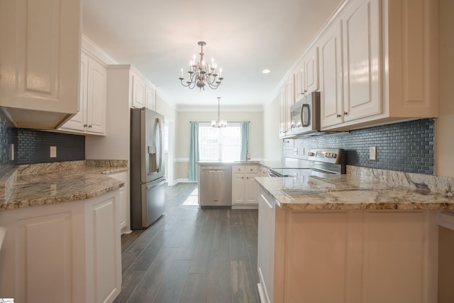 kitchen featuring white cabinetry and stainless steel appliances