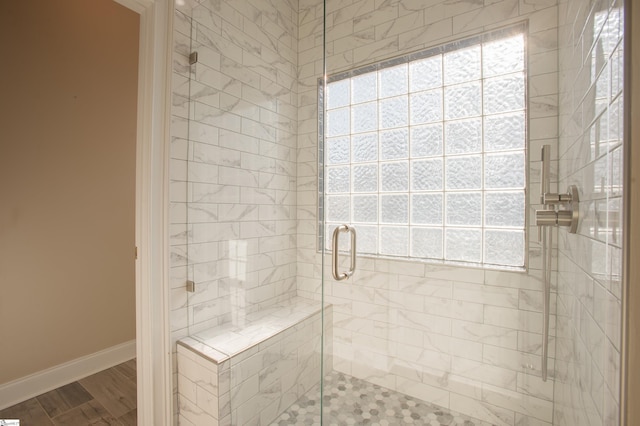 bathroom with an enclosed shower