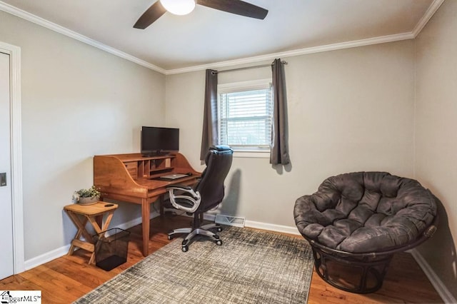 office area with hardwood / wood-style floors, ceiling fan, and ornamental molding