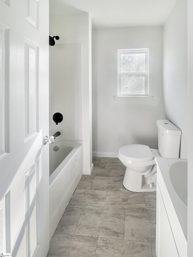 full bathroom featuring vanity, toilet, and plus walk in shower