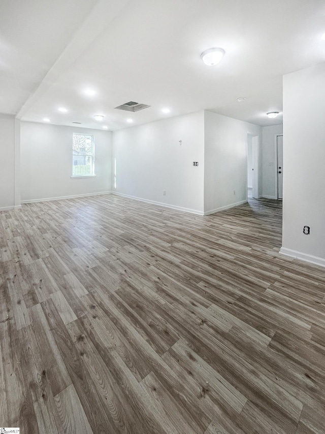 empty room featuring dark hardwood / wood-style floors