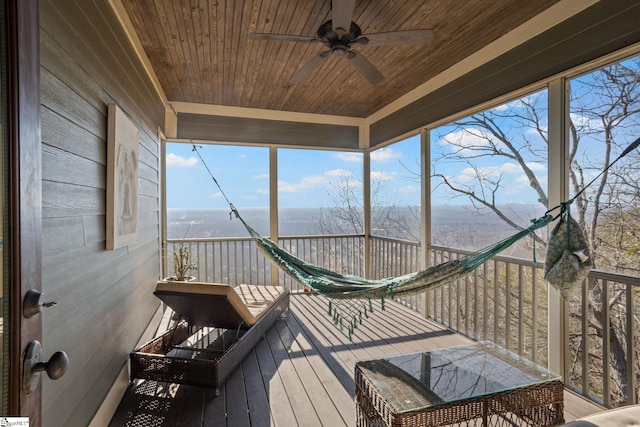 wooden terrace with ceiling fan