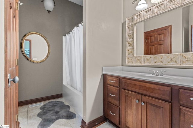 bathroom featuring shower / tub combo, vanity, and tile patterned floors