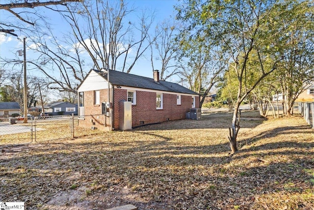 view of side of home with cooling unit