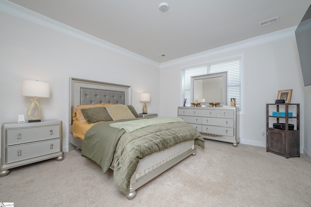 bedroom featuring crown molding and light carpet