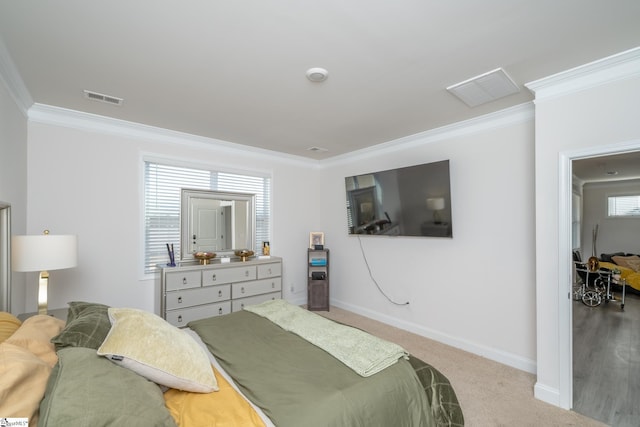 carpeted bedroom featuring ornamental molding