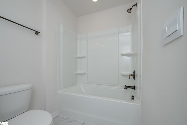 bathroom with shower / tub combination and toilet