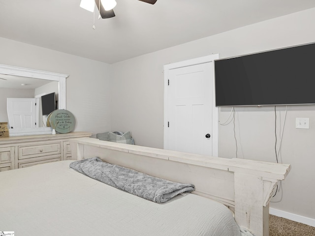 bedroom featuring carpet flooring, ceiling fan, and a closet