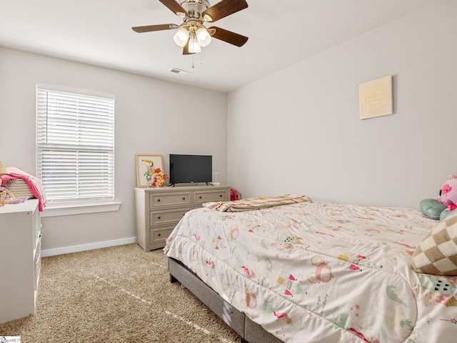 carpeted bedroom featuring ceiling fan