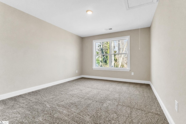 view of carpeted spare room