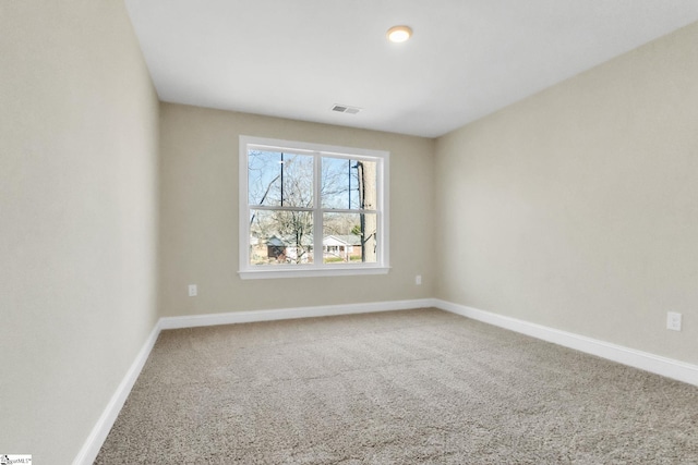 view of carpeted spare room