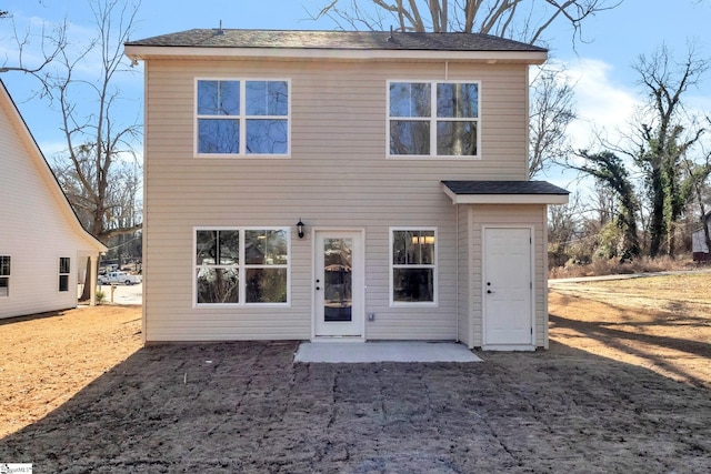 back of property featuring a patio area