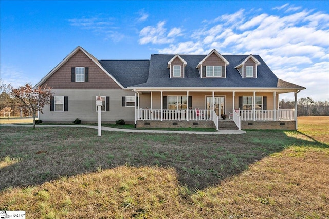 view of front of home with a porch and a front yard