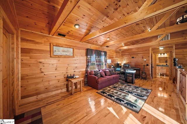 living room with wood ceiling, wood walls, hardwood / wood-style floors, and lofted ceiling with beams