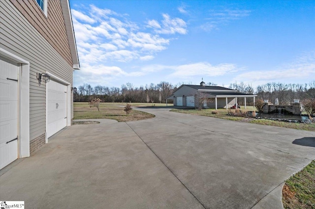 view of patio featuring a garage