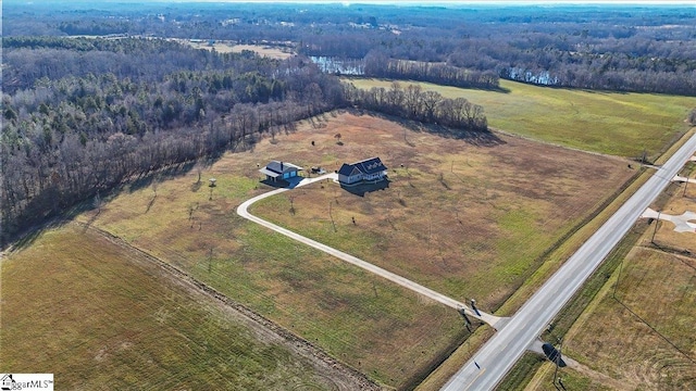 birds eye view of property featuring a rural view