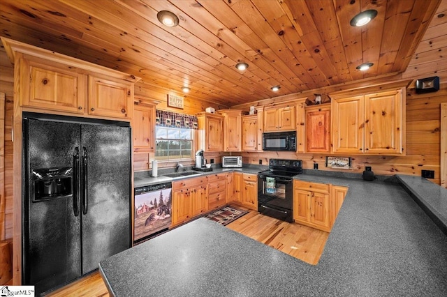 kitchen with black appliances, light hardwood / wood-style floors, wooden ceiling, and sink