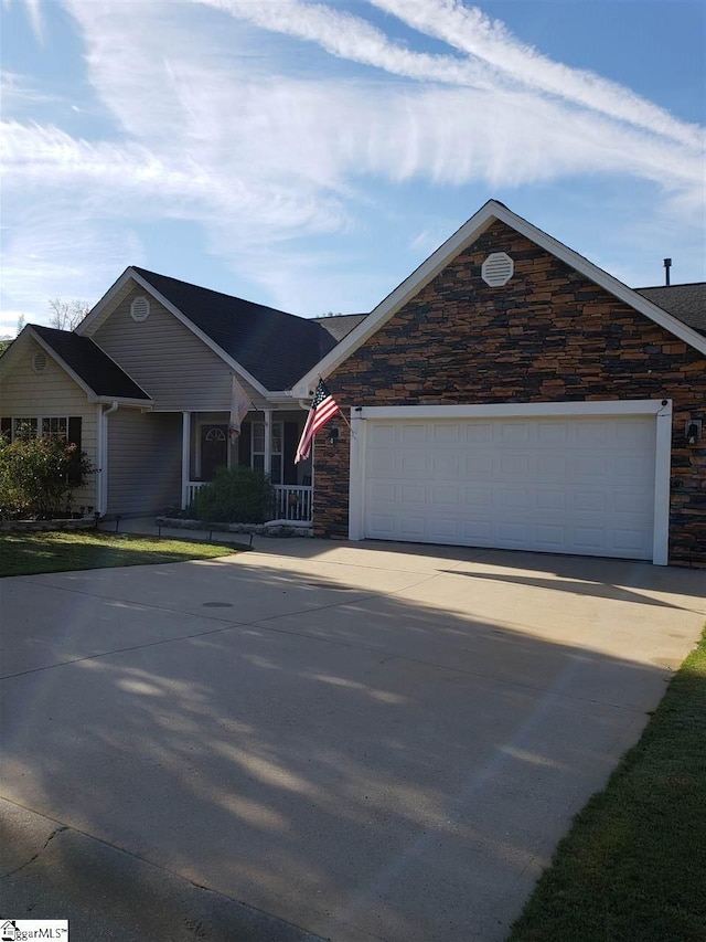 view of front of property with a garage