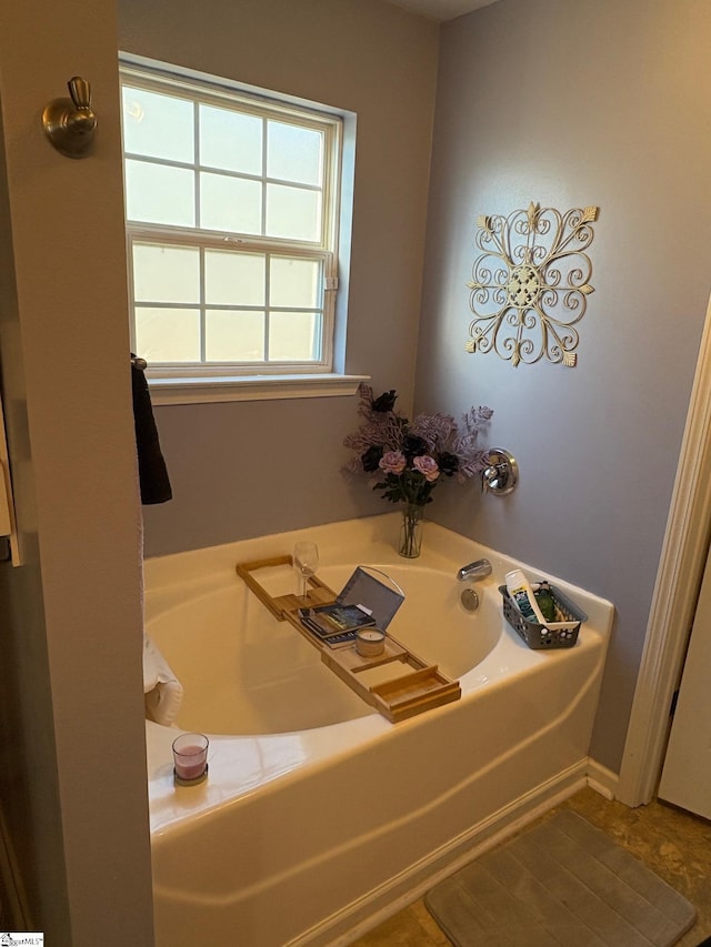 bathroom with a washtub