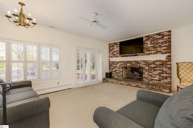 living room featuring carpet flooring, ceiling fan with notable chandelier, crown molding, a baseboard radiator, and a fireplace