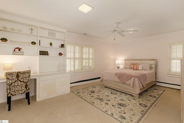 carpeted bedroom with baseboard heating, ornamental molding, and ceiling fan