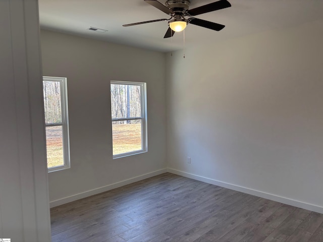 empty room featuring light hardwood / wood-style floors and ceiling fan