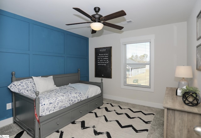 carpeted bedroom with ceiling fan