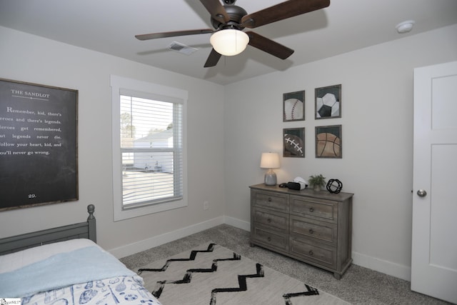 carpeted bedroom featuring ceiling fan