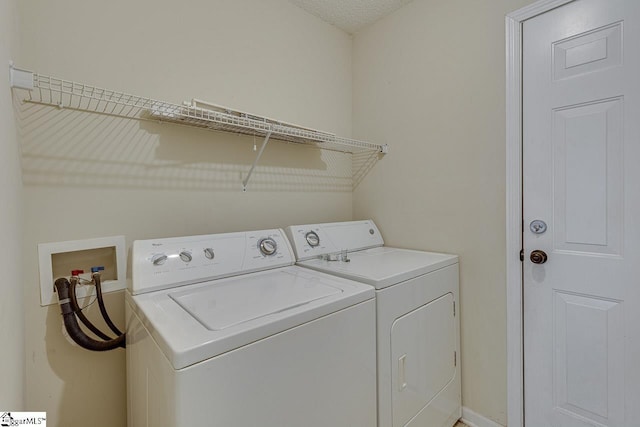 laundry area with washer and dryer